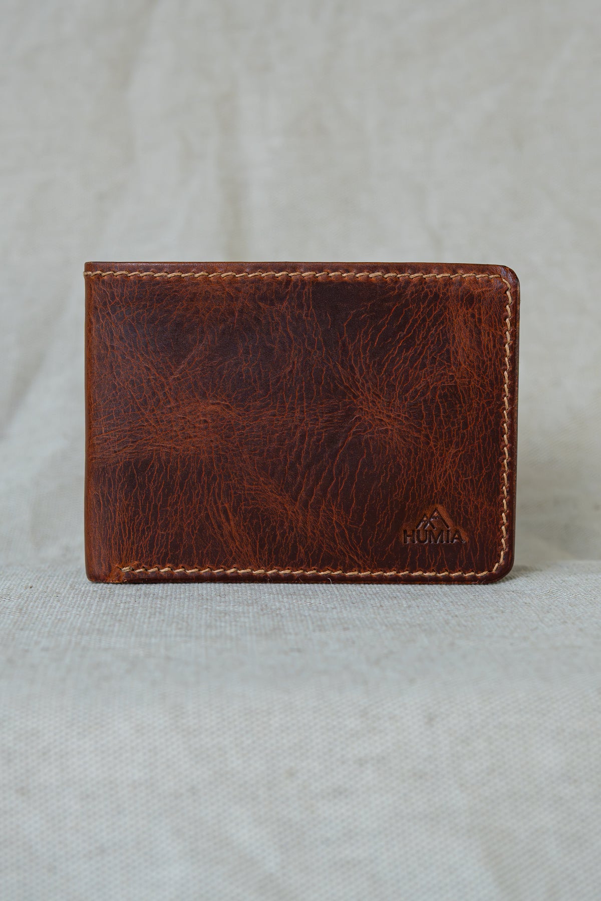 Portefeuille Tourmalet en cuir cognac et olive, vue de face